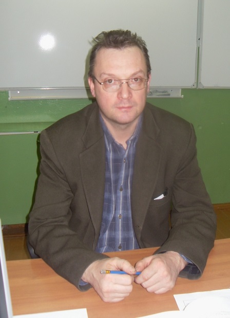 Фотография учителя информатики Коктомова А.В.